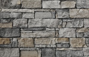 Kamenný obklad z betónu svojim vzhľadom a štruktúrou verne imituje prírodný kameň v šedej farbe o rozmere 10,8x15,5, 10,8x23,5, 10,8x39 cm.